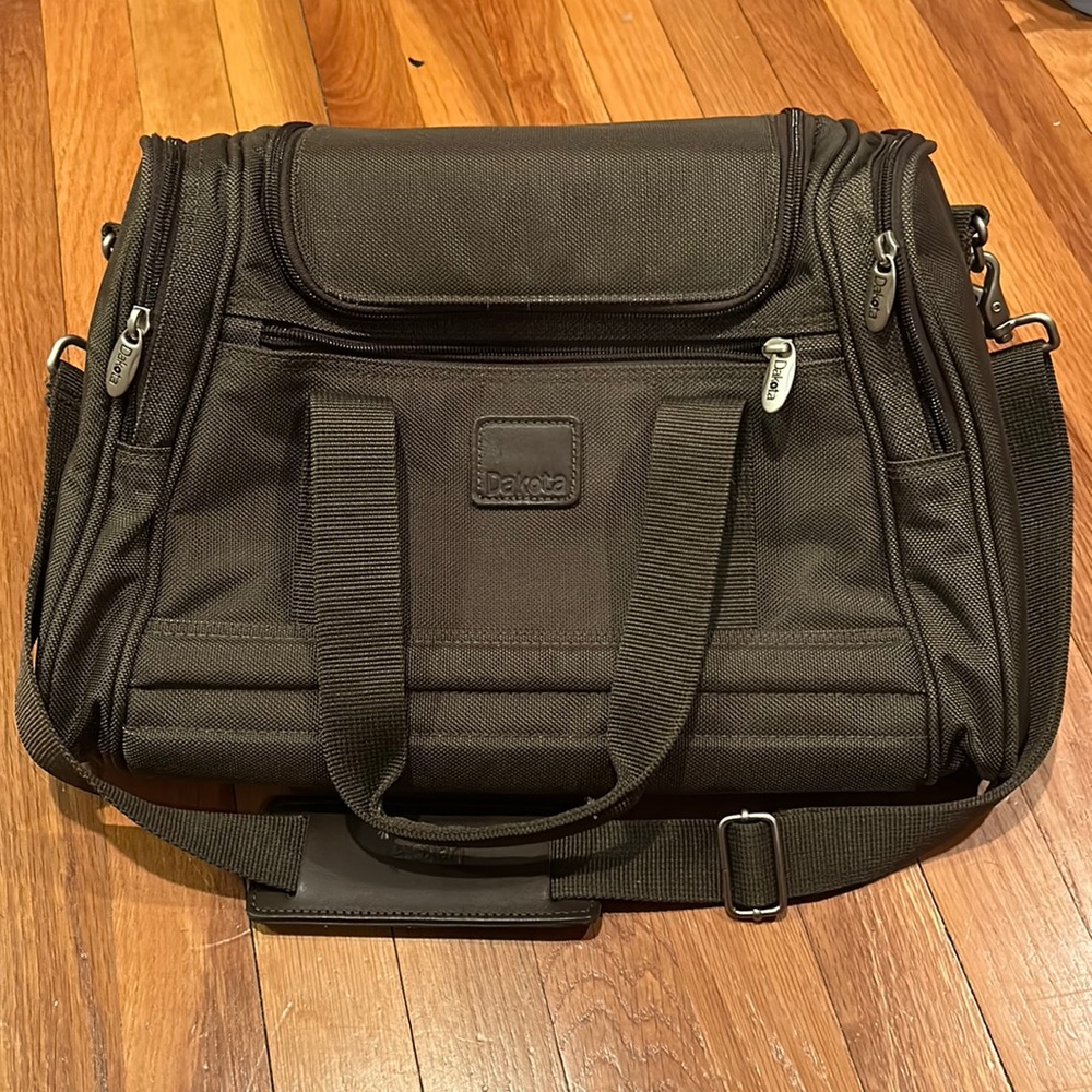 Dakota travel bag- used once all zippers in good condition with multiple pockets